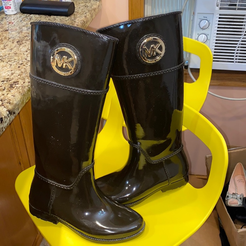 Original MK rain boots.Practically new! Leather outsole. Warm lining on inside.